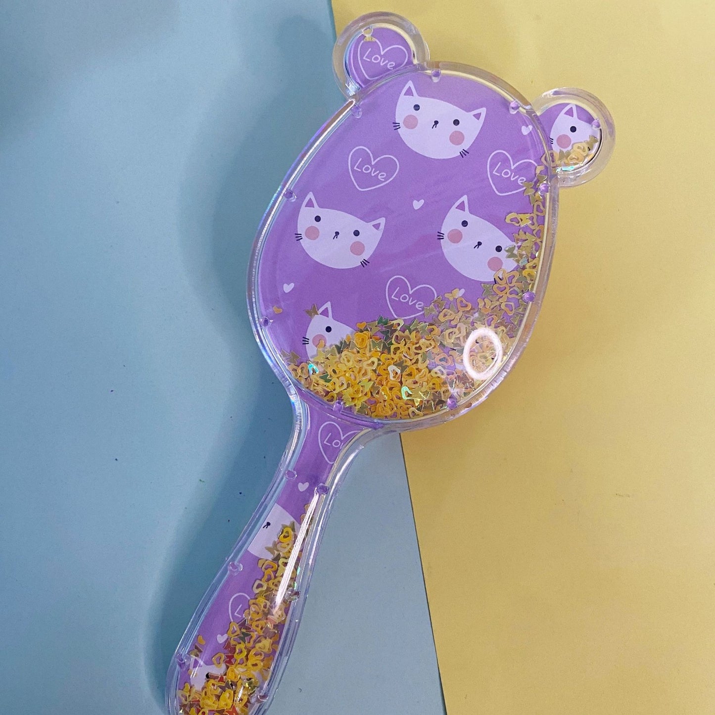 Confetti filled hair brush