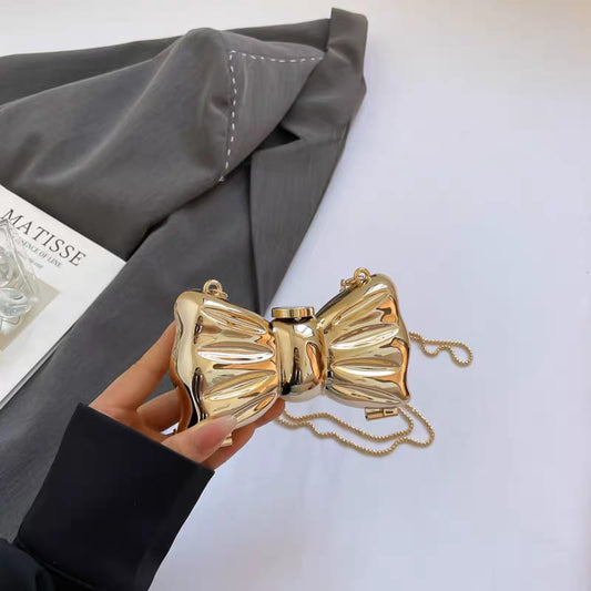 Bow Shaped Golden Clutch Bag