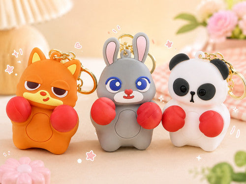 Trending punching box silicon keychain ( press and punch )